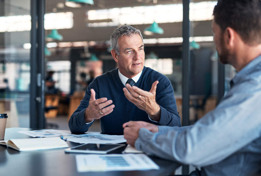 Ripple Learning - Two males in an office having a discussion - Conflict Resolution and ADR for Construction