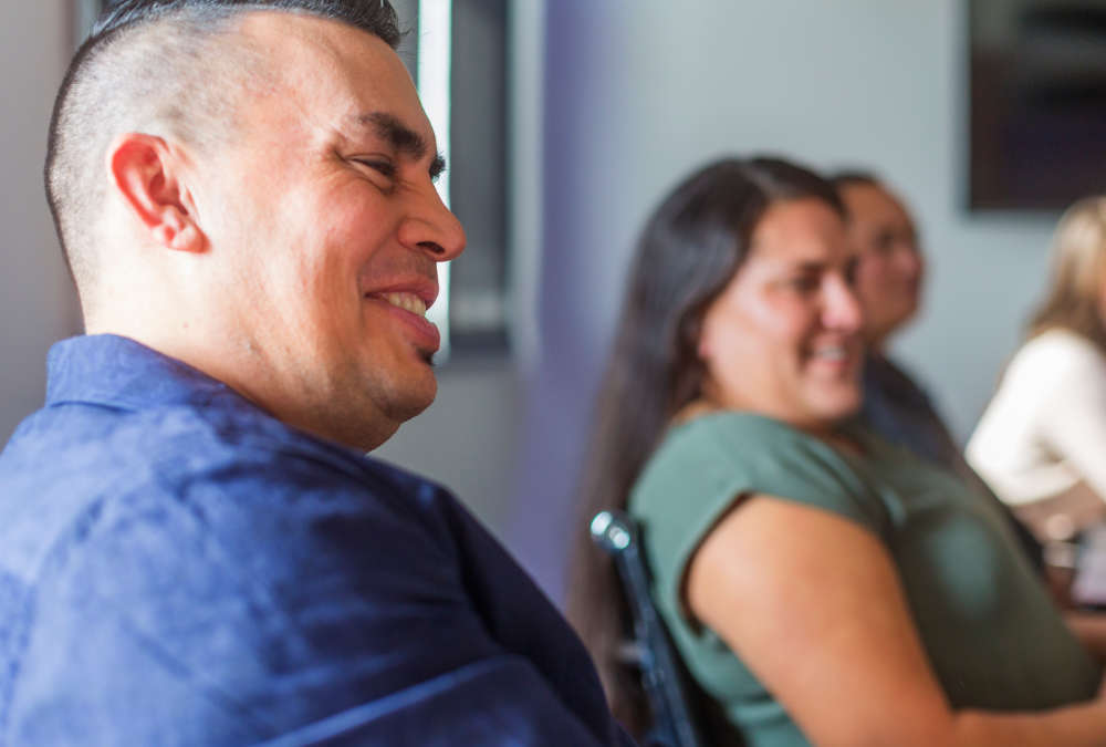 Ripple Learning - man and female seated smiling 