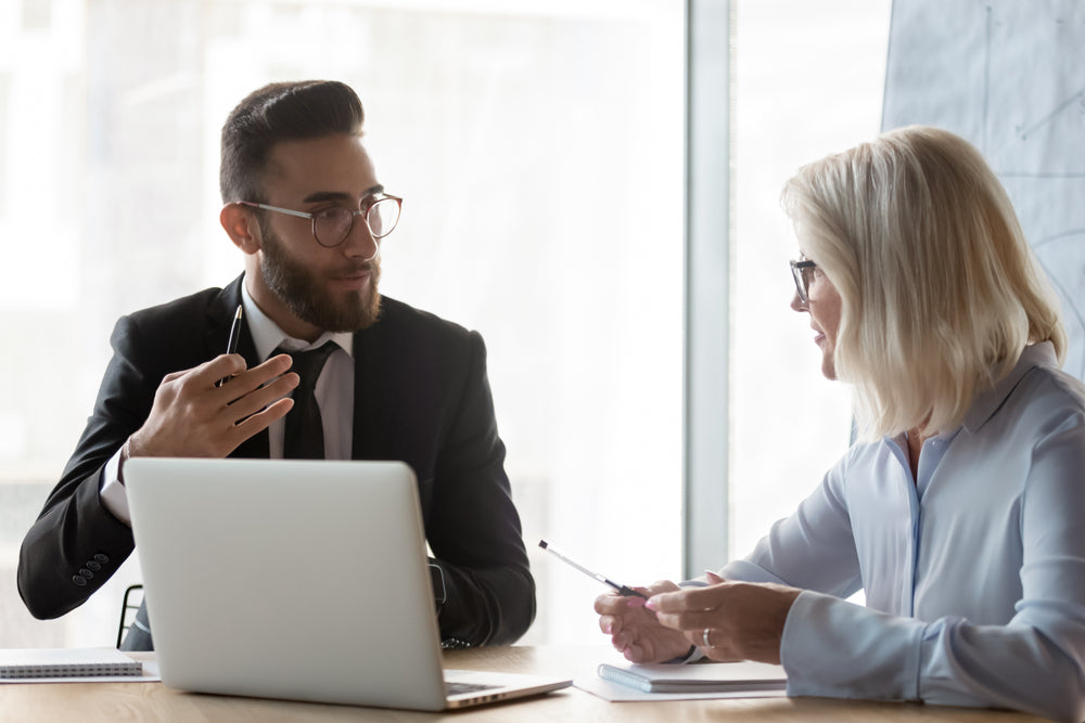 Ripple Learning Difficult Conversations Workshop Man calmly explaining talking to woman - Corporate Training